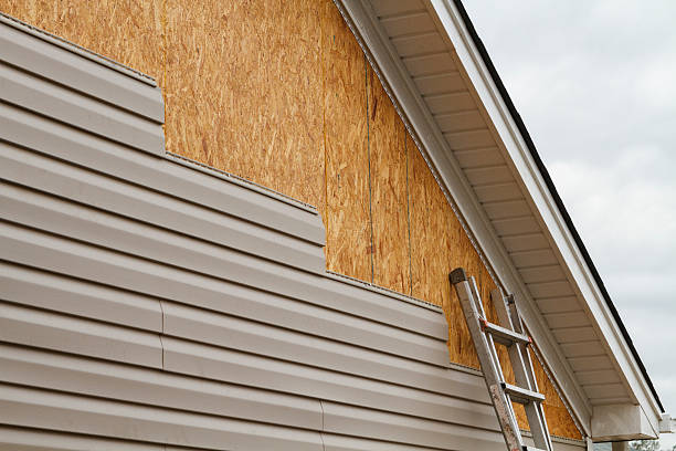 Professional Siding Installation technician working in Conyers, GA